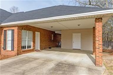 Carport with Attached Storage Area