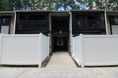 Doorway to property with a balcony