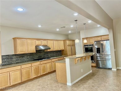 Kitchen featuring appliances with stainless steel