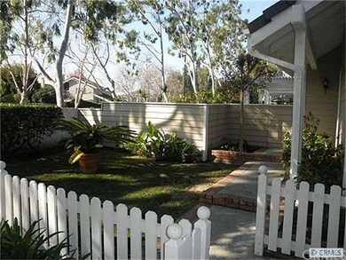 Large front yard provides attractive walkway to fr