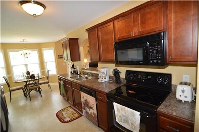 Kitchen to the eat-in area.  Both eating area are open to the Living Room