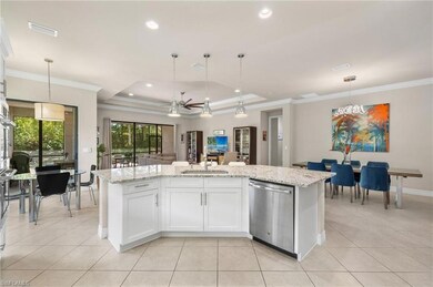 Kitchen featuring stainless steel dishwasher, whit