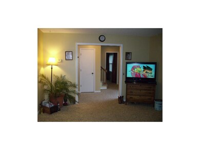 Another view of the living rm looking back into th