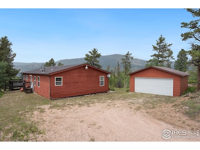 House and detached two-car garage.