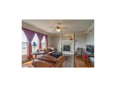 Light & Open Great Room With Beautiful Fireplace.