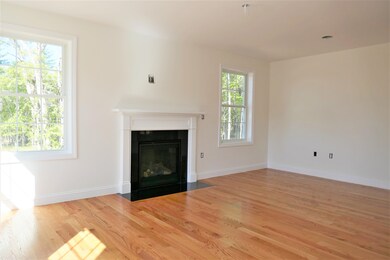 A warm ,cozy space to relax in with Hardwood floor