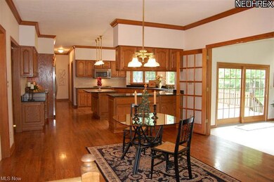 Gleaming hardwood floors, French doors to sunroom,