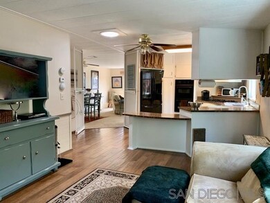View from family room through kitchen to dining ro