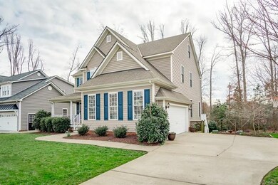 Side entry garage and flat level lot perfect for basketball or bike rides