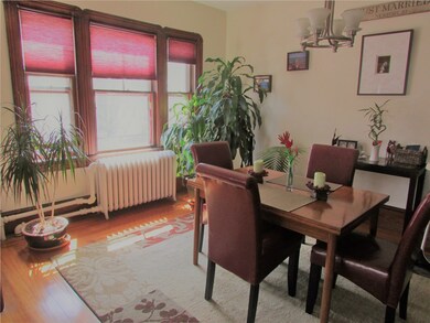 Bright and open Dining Room with hardwoods and bui