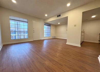 Unfurnished room featuring dark wood finished flo