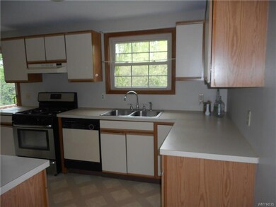 Applianced kitchen with stainless steel double sin