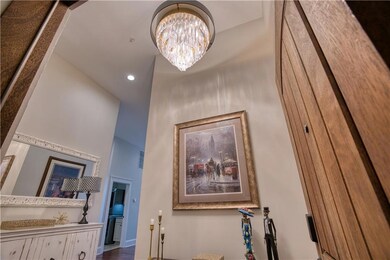 Beautiful new light fixture in foyer, quite a statement piece!