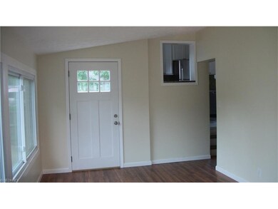 Freshly Painted large family room with beautiful h