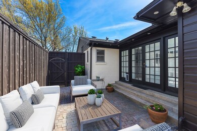 Patios flank both sides of the enclosed breezeway- entertainment possibilites.
