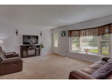 Lots of space in the living room, with big picture