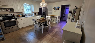 409 W 26th St, Higginsville, MO 64037 - photo 7