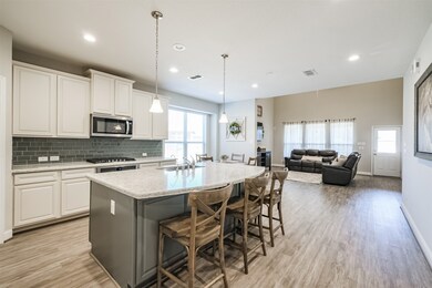 An open floorplan makes this home PERFECT for entertaining.