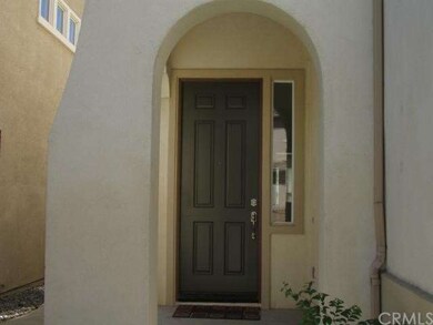 Arched entry is covered