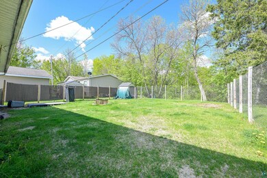 View of yard with an outdoor structure