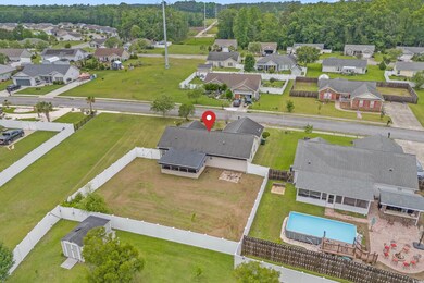 Aerial view of residential area with a pool area
