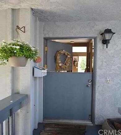 Front Dutch door, one of few in the complex.  West