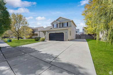 Traditional home featuring driveway, RV parking and a garage