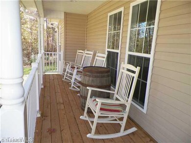 Facade/Exterior Front. Rocking chair front porch.