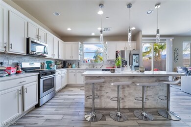 Kitchen with visible vents, a kitchen breakfast ba