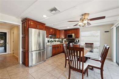 Kitchen with appliances with stainless steel finis