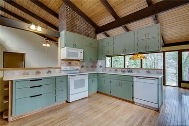 Open kitchen is the heart of this home.