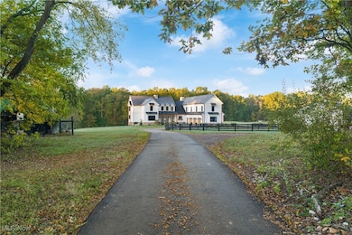 Modern farmhouse featuring a forest view