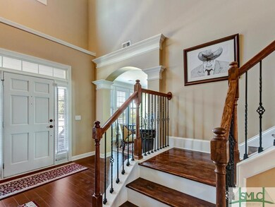 Sunny Entry with sidelights and transom windows of