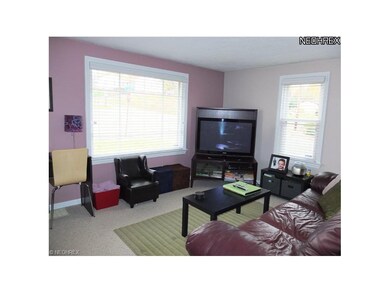 Living room with plantation blinds.