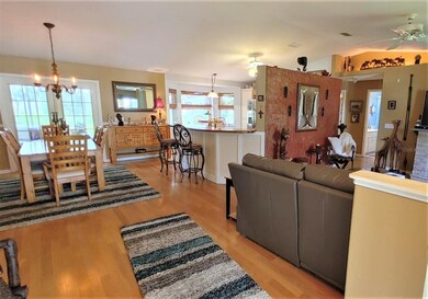 open to living and dining with bar height opening 