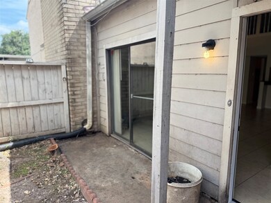 The spacious exterior patio extends from the livin