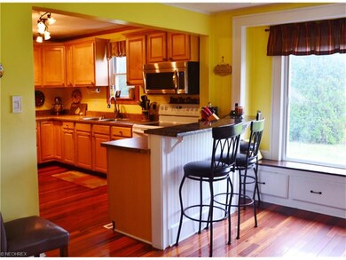 Maple kitchen with bar area