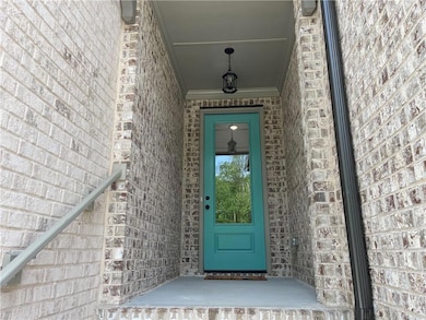 An 8' high front door to greet you and your guests!