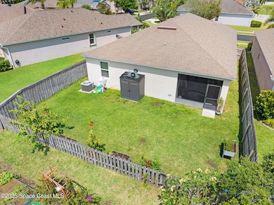 Fenced Backyard With Garden