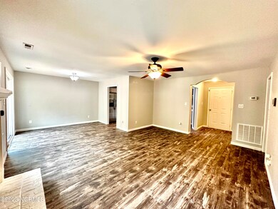 LIVING ROOM INTO FOYER