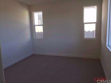 Master Bedroom with lots of windows to bring in th