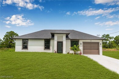 Prairie-style house with concrete driveway, an att