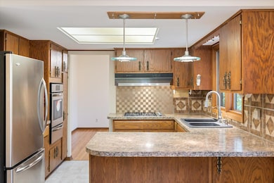 Kitchen with beautiful stainless steel appliances.