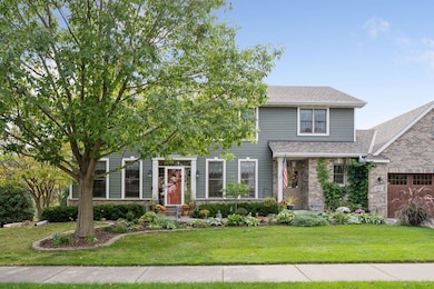 Lundgren Bros custom-built home with custom sidewalk pavers