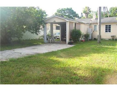 Yard/Garden - Exterior yard with covered patio area.