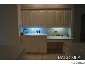 Raised Bar and Cabinets Galore