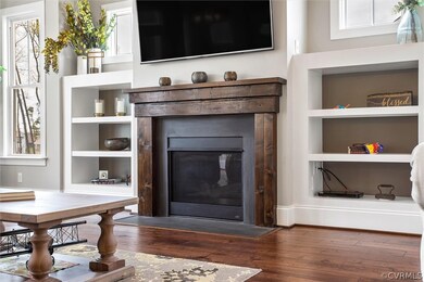 The Gas Fireplace has an amazing wood mantle with