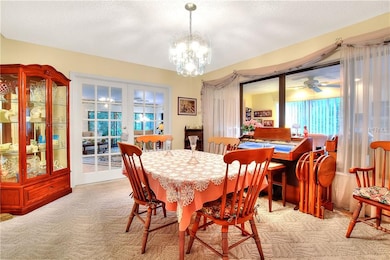 Dining Room w/ French Doors to Family Room