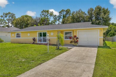 Ranch-style home featuring stucco siding, concrete driveway, an attached garage, and a shingled roof