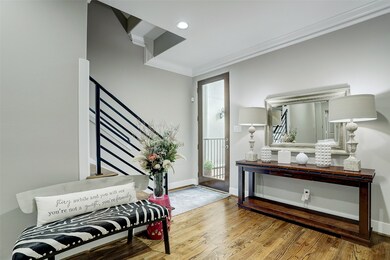 A spacious foyer welcomes you upon entry, setting